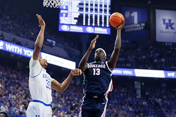Feb 10, 2024; Lexington, Kentucky, USA; Gonzaga Bulldogs forward Graham Ike (13) drives to the basket against Kentucky Wildcats forward Ugonna Onyenso (33) during the first half at Rupp Arena at Central Bank Center. Mandatory Credit: Jordan Prather-USA TODAY Sports